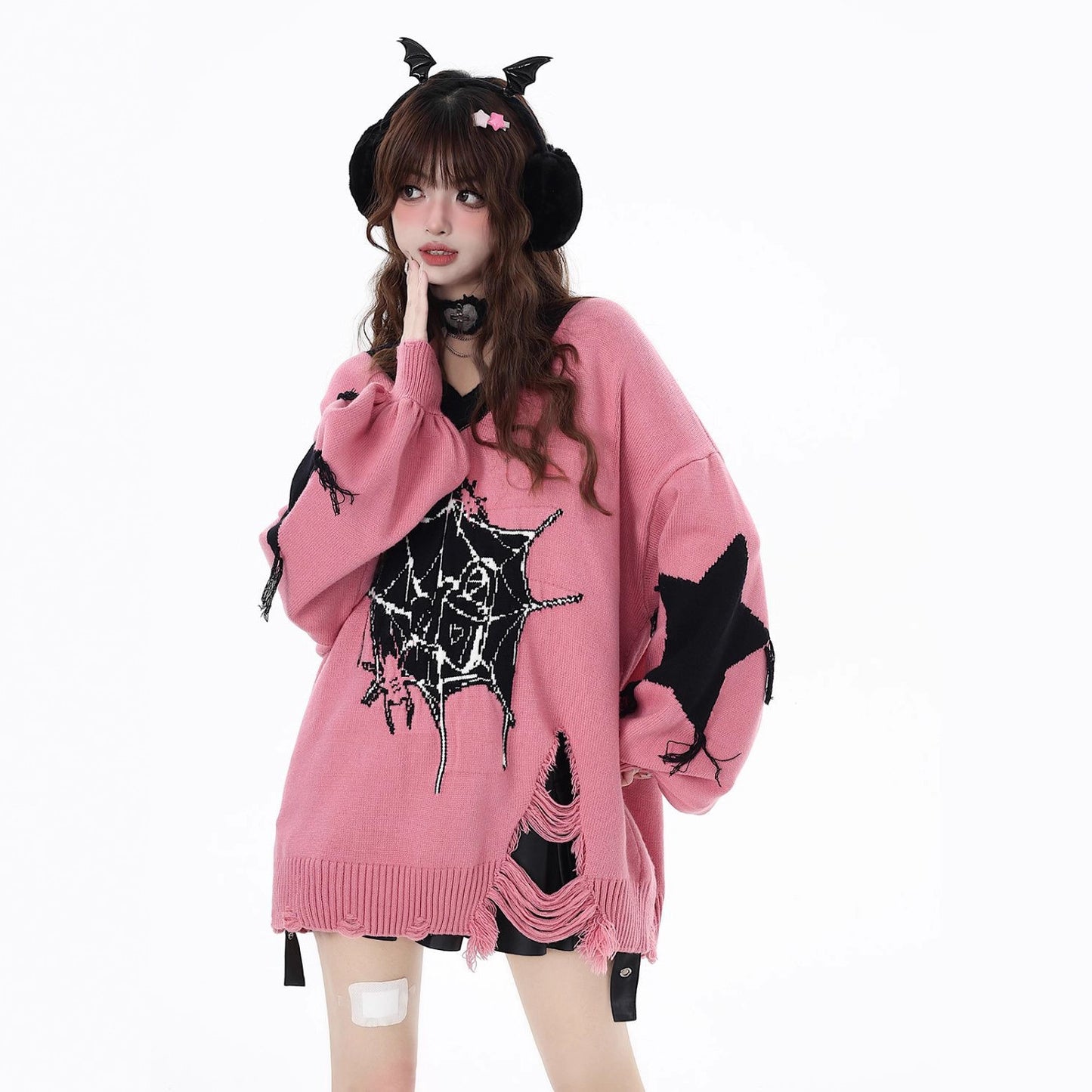 Relaxed V-neck knit sweater with paneling and mid-length design